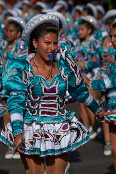 ARICA, CHILE - JANUARY 22, 2016: Caporales dance group performing at the annual Carnaval Andino con la Fuerza del Sol in Arica, Chile.