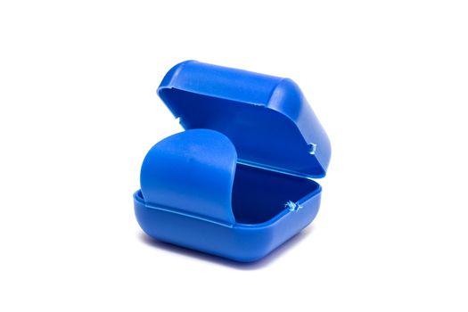 Small plastic blue box isolated on white background