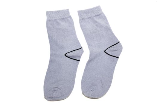 Pair of gray female socks isolated on a white background