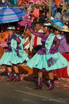 Arica, Chile - January 23, 2016: Morenada dance group performing a traditional ritual dance as part of the Carnaval Andino con la Fuerza del Sol in Arica, Chile.