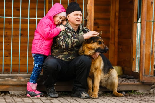 Senior man with his granddaughter. Child and grandpa outdoors. Benefits of getting older.