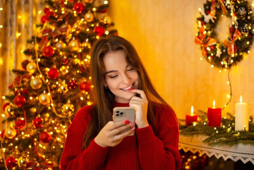 Smiling girl received message with greetings from close friends