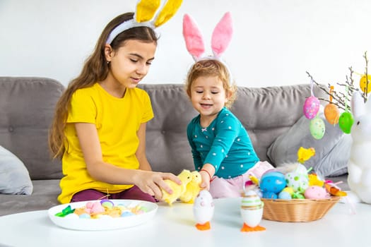 Happy Easter kid with eggs. Selective focus. Child.