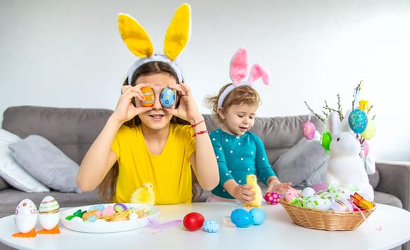 Happy Easter kid with eggs. Selective focus. Child.