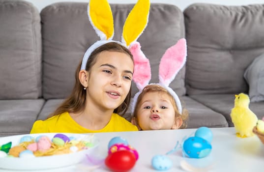 Happy Easter kid with eggs. Selective focus. Child.