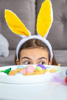 Happy Easter kid with eggs. Selective focus. Child.