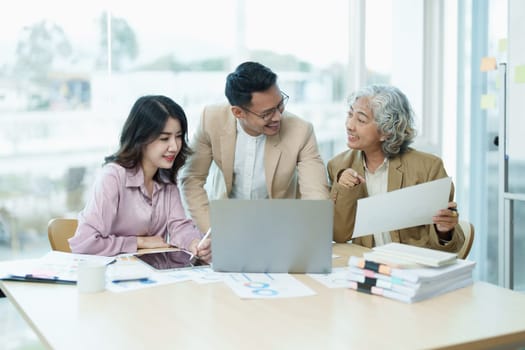 Asian entrepreneurs and business people meeting in a conference room in business planning, financial budget and investment risk assessment to analyze customer groups to increase company growth.