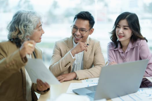 Asian entrepreneurs and business people meeting in a conference room in business planning, financial budget and investment risk assessment to analyze customer groups to increase company growth.