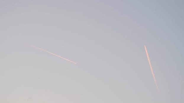 Tracks of planes in the blue sky