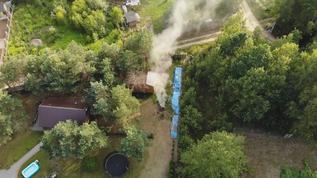 Burning fires at dachas. View from a drone