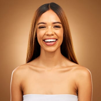 Smile, hair care and portrait of woman in studio for growth and color shine or healthy texture. Aesthetic female happy for haircare, natural beauty and hairdresser or salon gradient brown background.