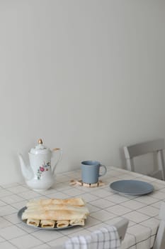 Thin pancakes, crepes for breakfast, making crepes, food photography