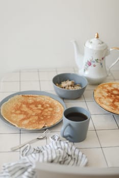 Thin pancakes, crepes for breakfast, making crepes, food photography