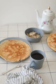 Thin pancakes, crepes for breakfast, making crepes, food photography