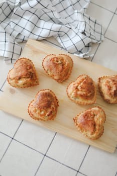 Freshly baked buns. Top view. Sweet Homemade Pastry baking. Close-up.