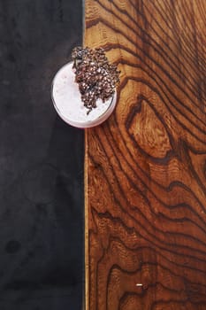 Delicious drink. Close up view of fresh summer cocktail on the wooden table.