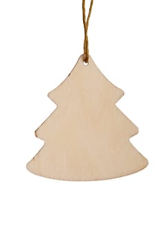 Christmas wooden tree isolated over white background. Small shape wooden tree