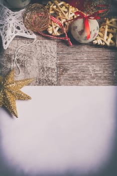 Letter to Santa with christmas ornaments arround in vintage toning