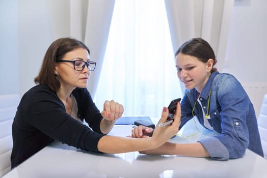 Mental health of adolescence, teenage girl talking with a counselor psychologist about her feelings