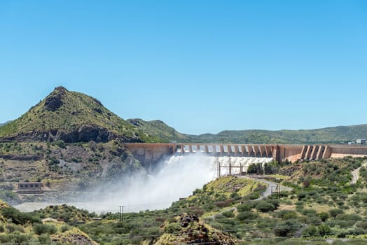 The Vanderkloof Dam overflowing. It is the second largest dam in South Africa. It has the tallest dam wall in South Africa