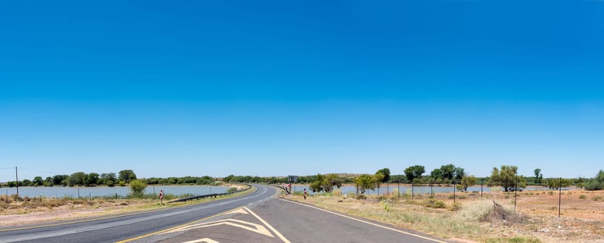 A balancing dam for the canal system between Groblershoop and Upington in the Northern Cape Province. Road N10 is visible