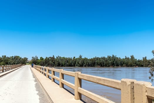 The road bridge over a flooded Orange River at Grootdrink in the Northern Cape Province