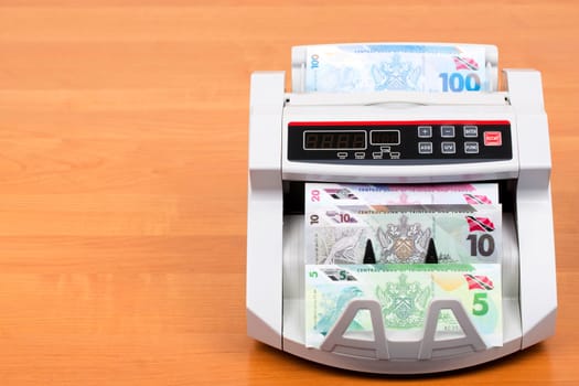 Trinidad and Tobago dollar in the counting machine