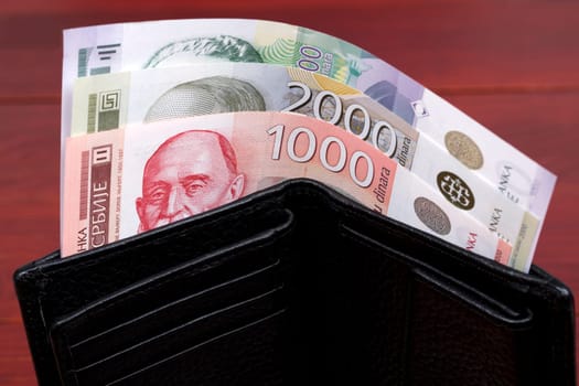 Serbian dinar in the black wallet