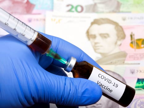 Vaccine against Covid-19 on the background of Ukrainian money