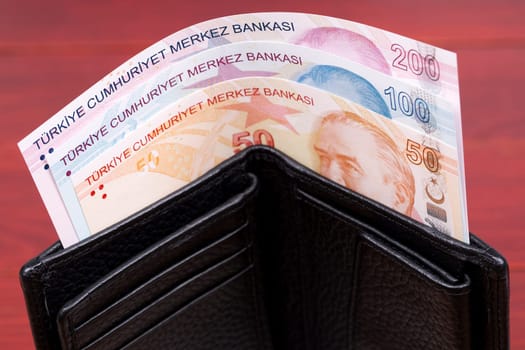 Turkish lira in the black wallet