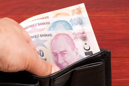 Turkish lira in the black wallet