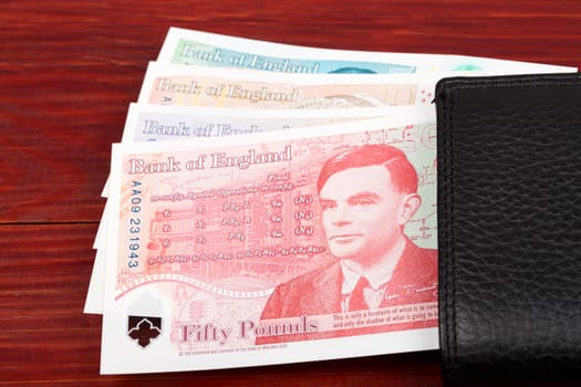 English Pounds in the black wallet