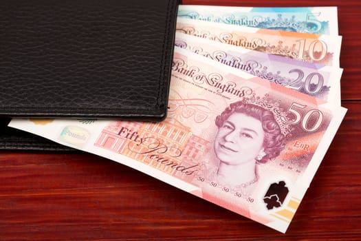 English Pounds in the black wallet