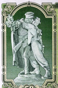 Statue of partisan with Russian soldier from Czechoslovak money