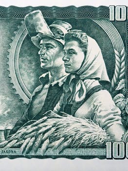 Workers - male and female from old Czechoslovak money