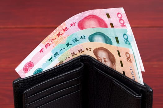 Chinese money in the black wallet