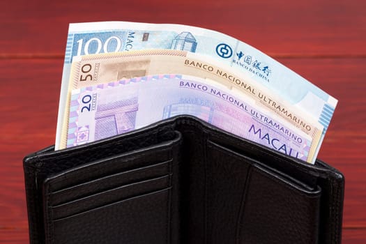 Macanese money - pataca in the black wallet