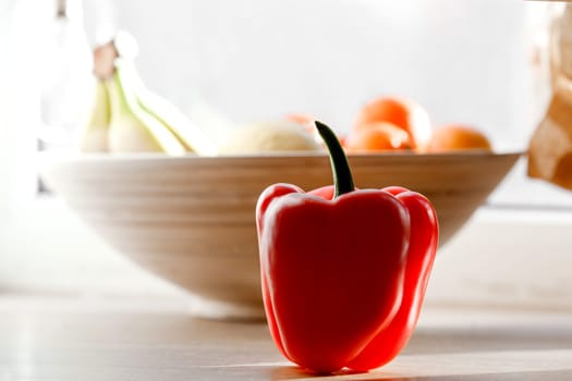 natural, organic Red pepper on wooden background. vegetarian concept. one pepper