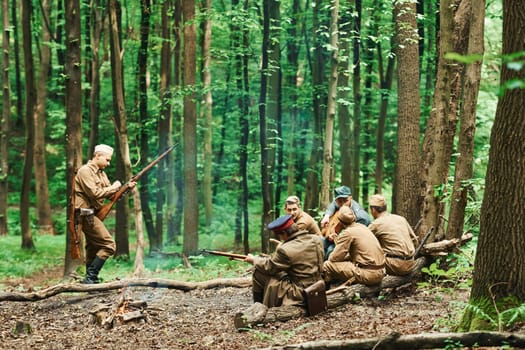 TERNOPIL, UKRAINE - June 2020 UPA Ukrainian Insurgent Army movie filming. Pictures of backstage. Soldiers taking a rest in the forest.