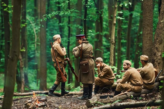 TERNOPIL, UKRAINE - June 2020 UPA Ukrainian Insurgent Army movie filming. Pictures of backstage. Soldiers taking a rest in the forest.