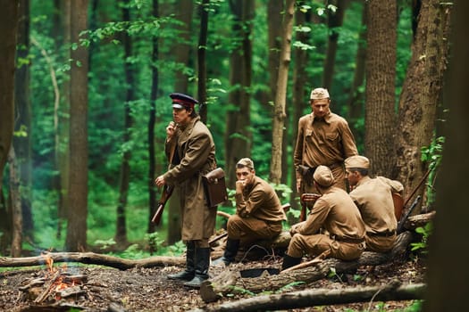 TERNOPIL, UKRAINE - June 2020 UPA Ukrainian Insurgent Army movie filming. Pictures of backstage. Soldiers taking a rest in the forest.