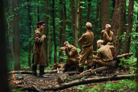 TERNOPIL, UKRAINE - June 2020 UPA Ukrainian Insurgent Army movie filming. Pictures of backstage. Soldiers taking a rest in the forest.