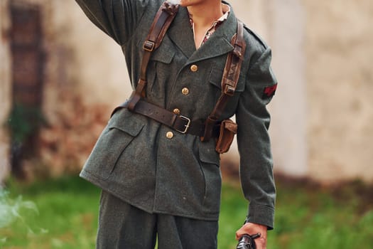 TERNOPIL, UKRAINE - June 2020 UPA Ukrainian Insurgent Army movie filming. Pictures of backstage. Close up view of young soldier with weapon.