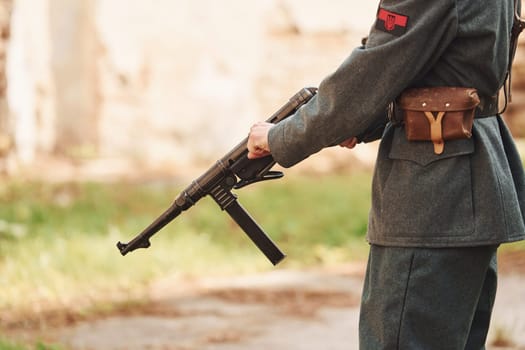 TERNOPIL, UKRAINE - June 2020 UPA Ukrainian Insurgent Army movie filming. Pictures of backstage. Close up view of young soldier with weapon.