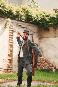 TERNOPIL, UKRAINE - June 2020 UPA Ukrainian Insurgent Army movie filming. Pictures of backstage. Young soldier throwing grenade.