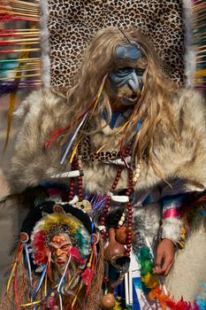 Arica, Chile - January 23, 2016: Tobas dancers in traditional Andean costume performing at the annual Carnaval Andino con la Fuerza del Sol in Arica, Chile.