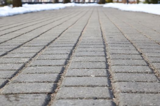 Concrete gray pavement slabs for floor or path close up, background or texture