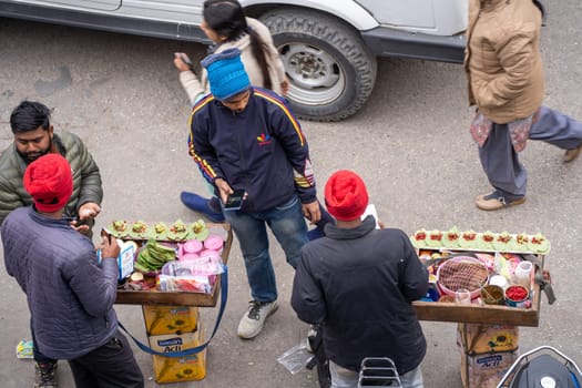 Manali, HImachal Pradesh, India - circa 2023 :Road side paan sellers selling this sweet mouth fresher delicacy on mall road manali a popular tourist spot for food and shopping