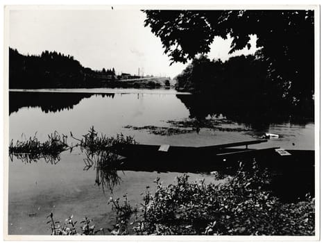 THE CZECHOSLOVAK SOCIALIST REPUBLIC - CIRCA 1960s: Retro photo shows view on the lake. Black & white vintage photography