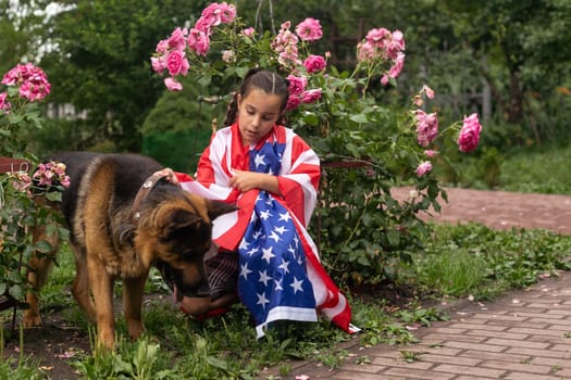 Happy adorable little girl smiling and waving American flag outside, her dress with strip and stars, cowboy hat. Smiling child celebrating 4th july - Independence Day. High quality photo